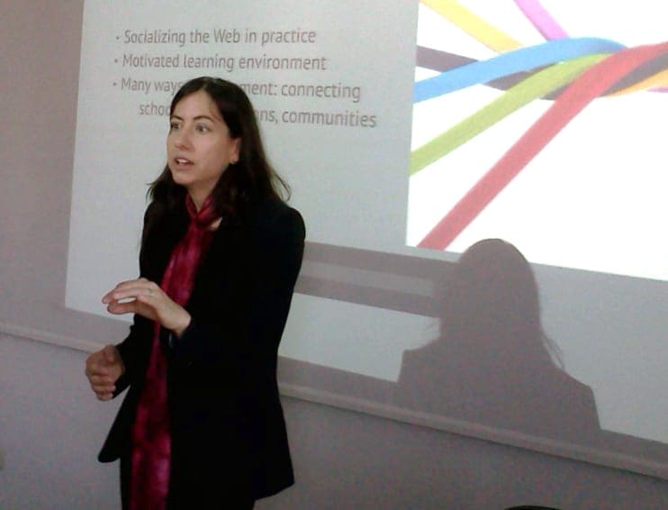Lecturer Melanie Faizer presents at the 2013 Media Convergence conference in Romania.