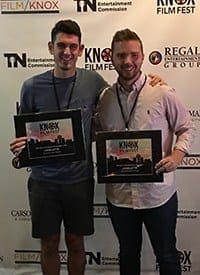 Matt Freels with Fowler receive their award at the Knox Film Festival.